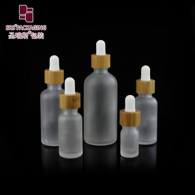 kopen Custom Frosted Essential Oil Empty Packaging 15ml 30ml 50ml 100ml Bamboo Dropper Bottle online vervaardiging